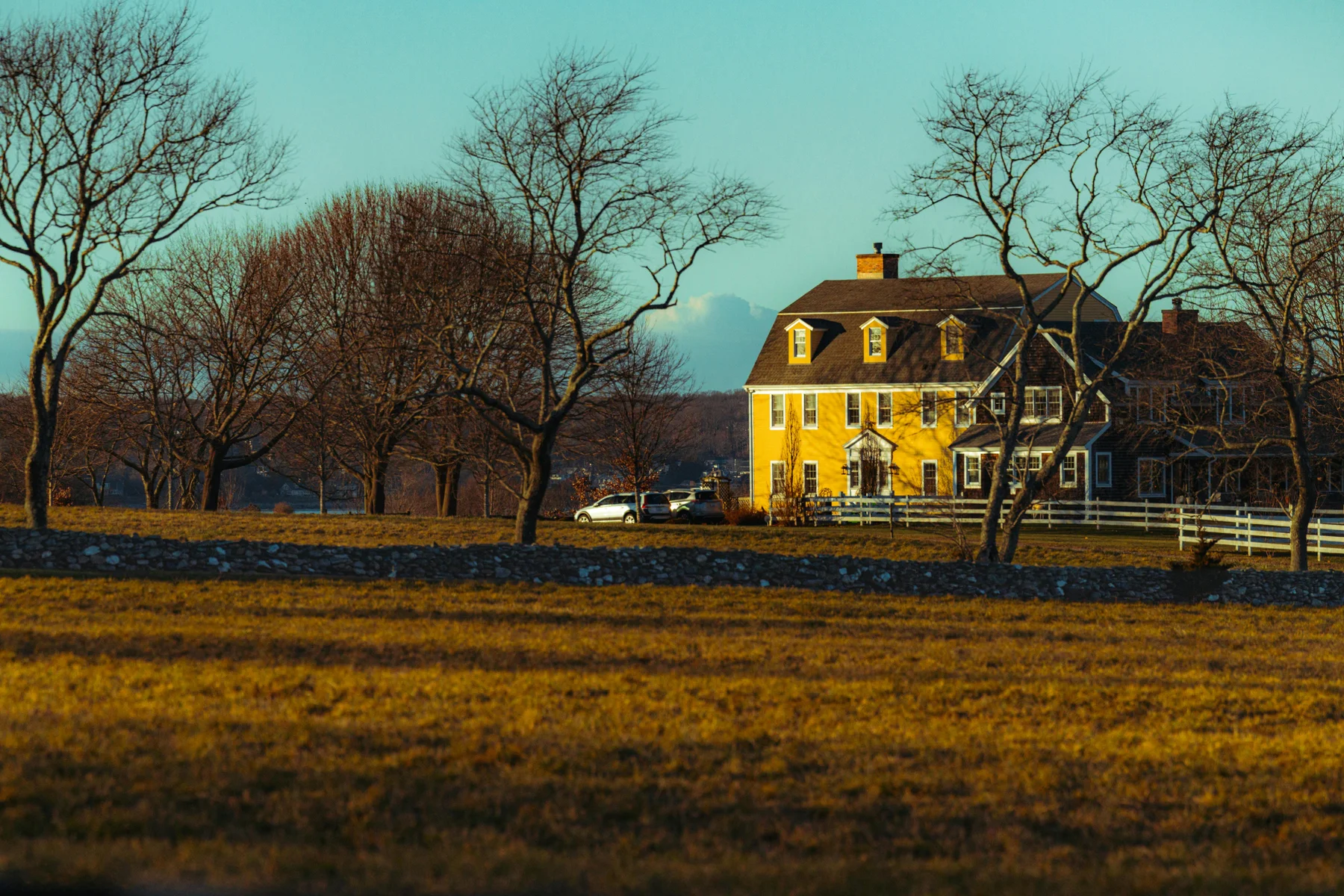 Yellow colonial home in New England